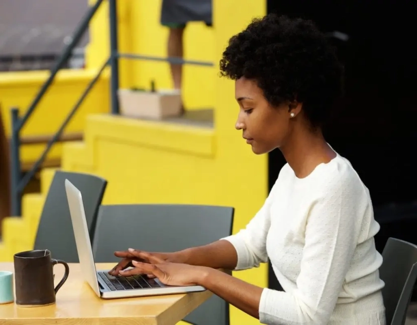 Services attractive-young-woman-using-laptop-outside-P9RLFGU@2x-1024x798-1.jpg
